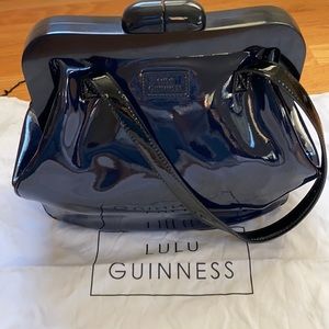 Vintage Lulu Guinness top clasp bag. Navy patent leather with black trim
